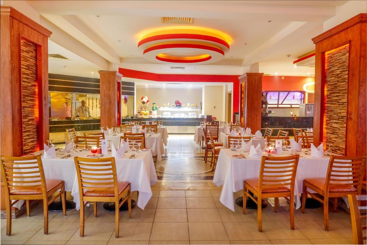 Hotel Charmillion Club Aquapark Sharm el Sheikh Esterno foto The interior of the restaurant