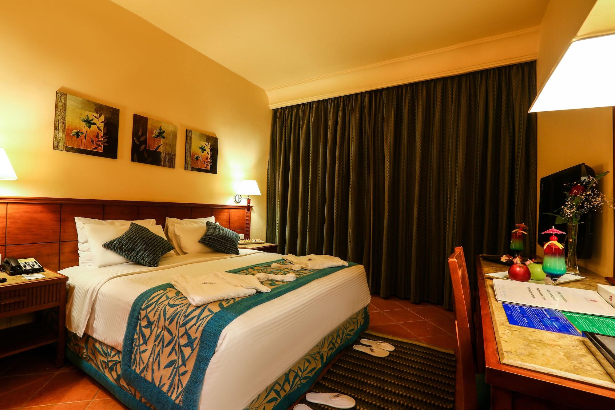 Hotel Charmillion Club Aquapark Sharm el Sheikh Esterno foto A bedroom at the hotel